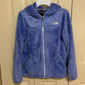 Blue fuzzy hooded zip up jacked by The North Face. Girl 14/16.